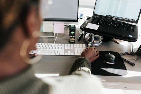 A Women Enjoying Cannabis Products while Work from Home